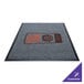 A grey Guardian EliteGuard Berber carpet with a red and orange logo on it.