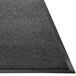 a close up of a black carpet