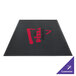 A black rectangular entrance mat with a red logo.