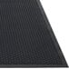 A black rubber Guardian Clean Step entrance mat with dots.