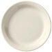 A close up of a Libbey Porcelana Cream white plate with a plain edge.