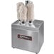 A stainless steel Bar Maid glass polisher with three brushes on top.