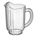 A clear polycarbonate pitcher with a handle.