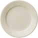 A Libbey Porcelana white porcelain plate with a plain edge.