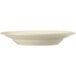 A Libbey Porcelain pasta bowl with a white border on a white surface.