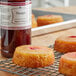 A close-up of a pineapple cake on a cooling rack.