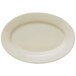 A Libbey Porcelana cream white oval platter with a wide rim.