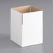 a white box with a cut out top