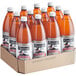 A cardboard box filled with 12 Goslings Diet Ginger Beer bottles on a counter.