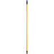 A close up of a yellow and black Lavex broom handle.