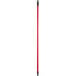 A red metal pole with a black handle.