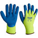 A pair of Cordova yellow thermal gloves with blue crinkle latex palms.