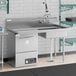 A Regency stainless steel undercounter dishtable with a sink, dishwasher, and shelf.