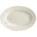 An Acopa ivory stoneware platter with a wide rim.