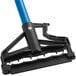 A close up of a black and blue Lavex metal mop handle with a blue quick release handle.