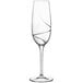 A Luigi Bormioli Aero flute wine glass with a curved stem.