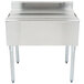 A stainless steel Eagle Group underbar ice chest with legs.