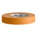 A roll of orange heavy-duty masking tape.