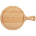 A Boska beech wood serving board with handle.