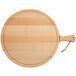 A round beech wood serving board with a handle.