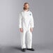 A man wearing a white Malt Impact ProMax coverall.
