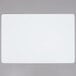A white rectangular Tablecraft flexible cutting board with a black border.