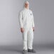 A man wearing a white Malt Impact ProMax protective suit.