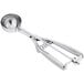 A silver stainless steel round ice cream scoop with a squeeze handle.