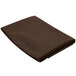 A folded brown Intedge cloth table cover.