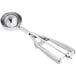 A stainless steel round ice cream scoop with a squeeze handle.
