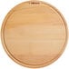 A Boska large round beech wood serving board.