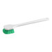 A white and green Lavex pot scrub brush.