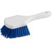 A blue and white Lavex pot scrub brush.