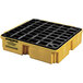 A yellow plastic container with black grate.