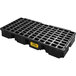 A black plastic pallet with holes for two drums.