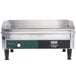 A Waring commercial countertop griddle with a green control panel.