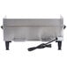 A Waring stainless steel electric countertop griddle with a cord attached.