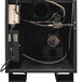 A black matte Quick Ship Primo RAVEN-Xr15 coffee roaster with cables inside.