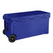 A navy blue CaterGator outdoor cooler with wheels.