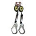 Two yellow and black Honeywell Miller TurboLite personal fall limiters with metal locking rebar hooks and carabiners.