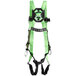 a green harness with black straps