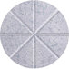 A close-up of a Versare SoundSorb marble gray beveled circular star panel with a circular pattern.