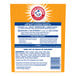 A red and white Arm & Hammer label on a box of Crisp Clean HE Powder Laundry Detergent.