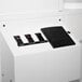 A white Primo coffee roaster with switches and a black rectangular panel.