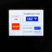 A Primo RAVEN-Xr15 coffee roaster with a digital temperature and time display.