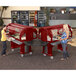 A group of women standing by a red Cambro Versa food buffet table.