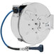 A silver T&amp;S hose reel with a blue and silver hose attached.