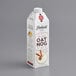 A white Elmhurst Milked Oat Nog carton.