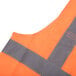 a close up of an orange vest