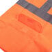 A Cordova orange high visibility safety vest with reflective stripes.